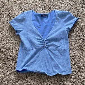 Brandy Melville blue flowered top, great condition! hasn’t been worn a-lot.
